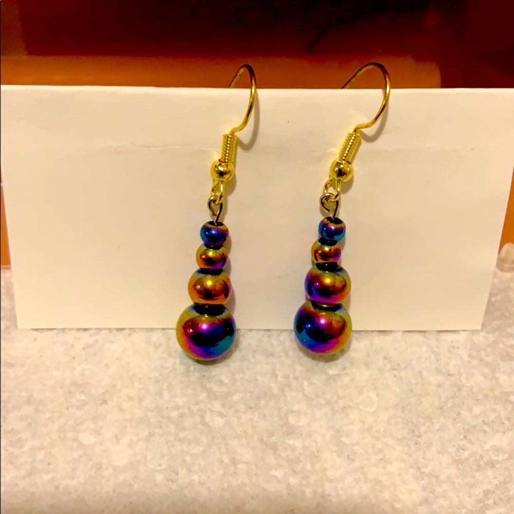 Women’s handmade gold earrings.
